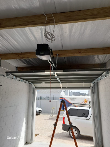 inside garage, roller shutter door with motor on ceiling